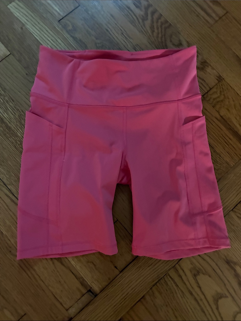 Athleta Coral Pink High-Rise Bike Shorts with Side Pockets